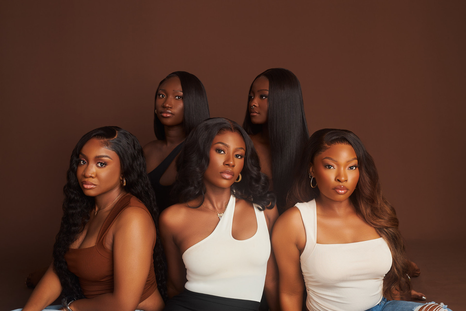 Five women wearing WigHub wigs
